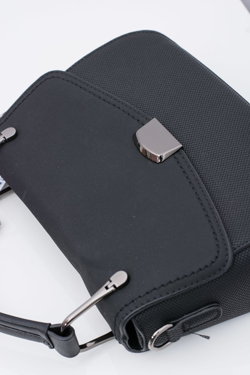 Чорна жіноча сумочка комод