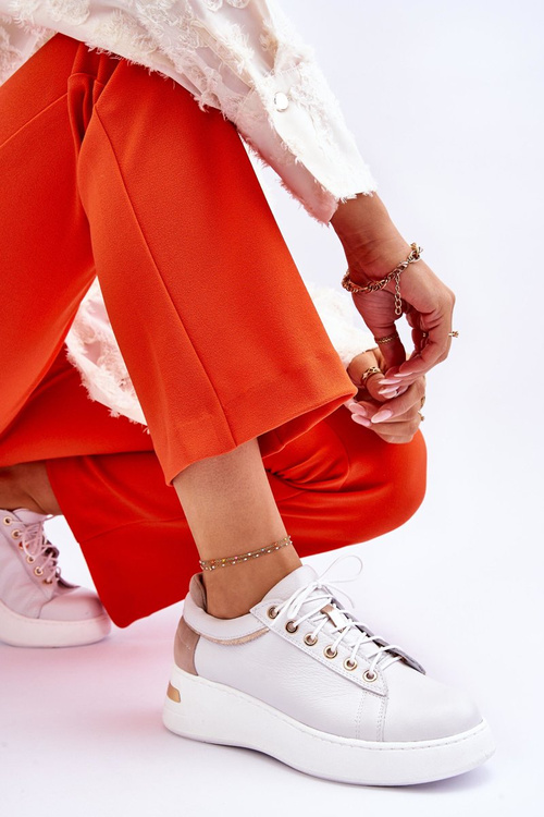 Жіноче шкіряне спортивне взуття на платформі білого кольору Caressa