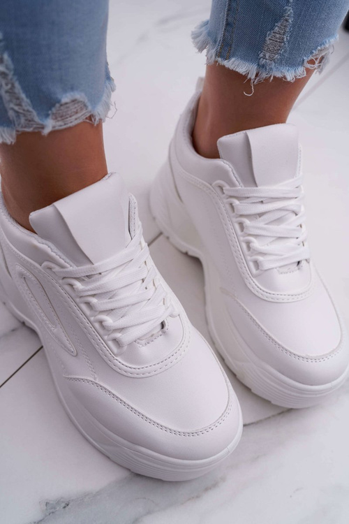 Жіноче спортивне взуття на високій підошві білі гучніше