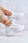 Жіноче блискуче спортивне взуття на танкетці білого кольору Activity