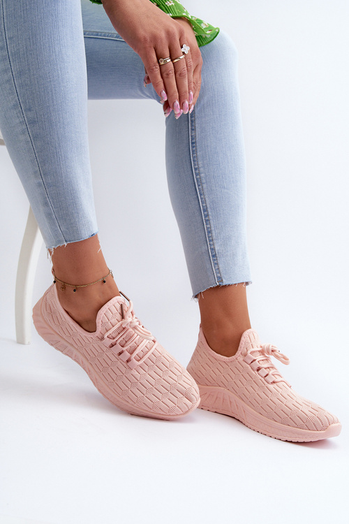 Жіноче спортивне взуття з легкої тканини рожевого кольору