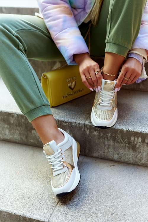 Модне спортивне взуття Жіночі кросівки біло-золоті Danielle