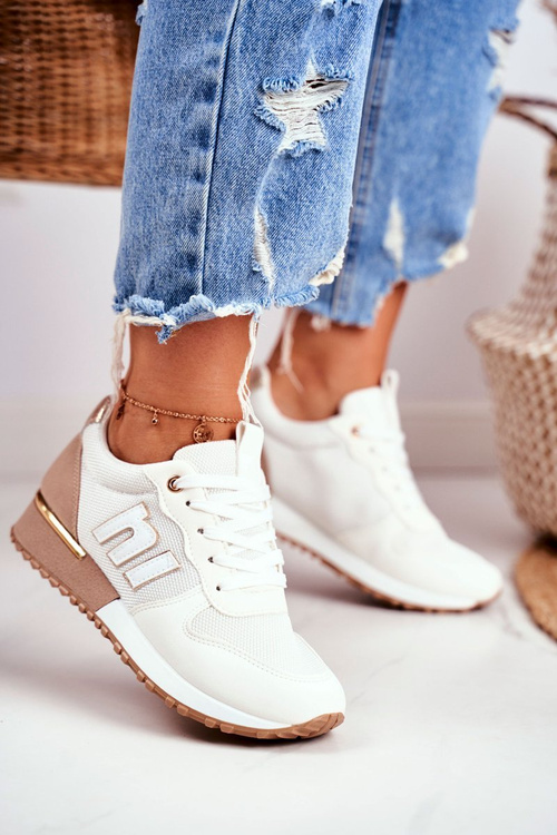 Жіноче спортивне взуття Кросівки біло-бежеві Maddie