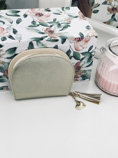 Золотий жіночий гаманець з китицею