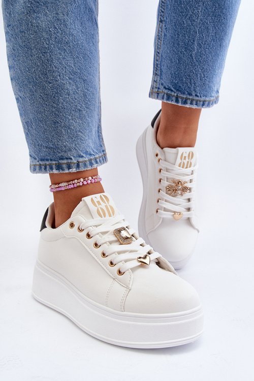 Жіночі кросівки на платформі з білими прикрасами Herbisa