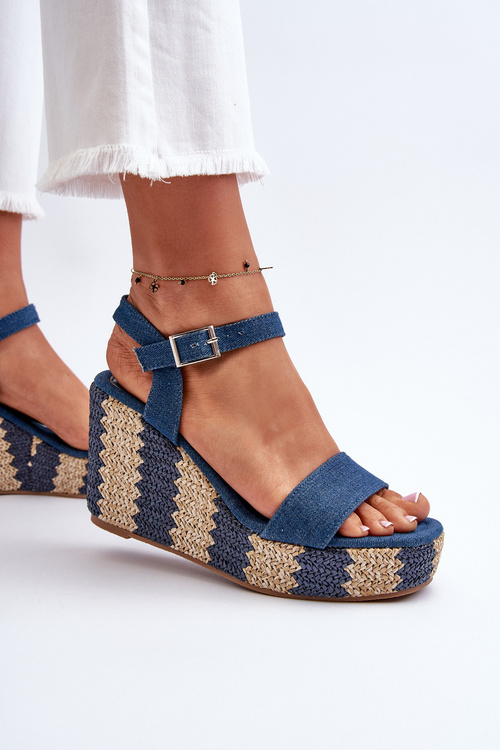 Жіночі джинсові босоніжки на танкетці з косою синього кольору Reviala