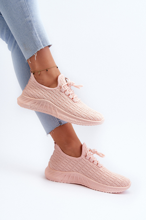 Жіноче спортивне взуття з легкої тканини рожевого кольору