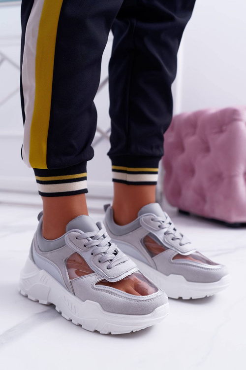 Спортивні жіночі кросівки на прозорій сірій товстій підошві