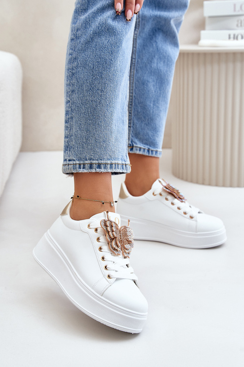 Жіночі кросівки на платформі з біло-золотим нарітевієм у вигляді метелика