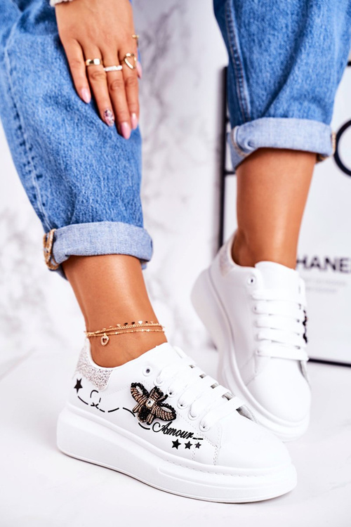 Жіноче спортивне взуття Кросівки з мушкою білого срібла Amour