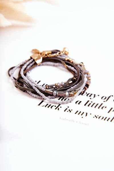 Жіночий браслет з перлами і кристалами сірий