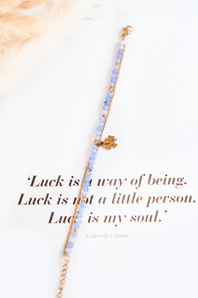 Жіночий браслет з намистин синьо-золотий