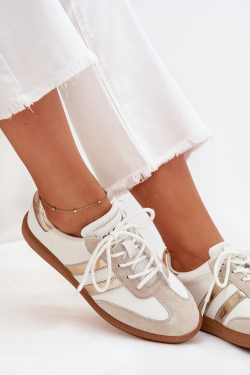 Низькі шкіряні кросівки для жінок біло-золоті Ismina