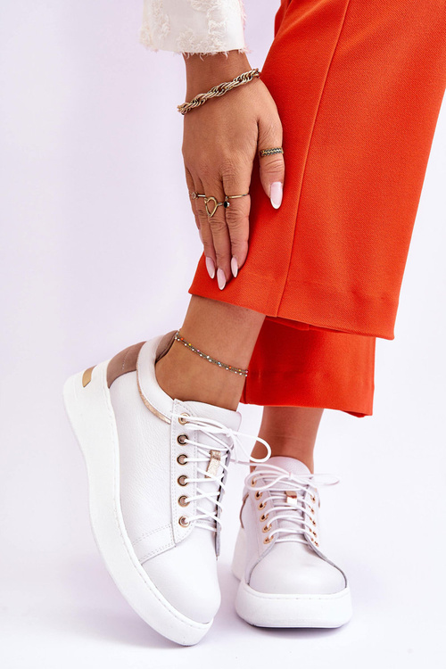 Жіноче шкіряне спортивне взуття на платформі білого кольору Caressa