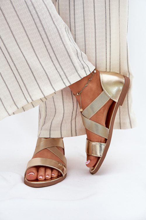 Жіночі плоскі сандалі з еластичними ремінцями золоті Marinea