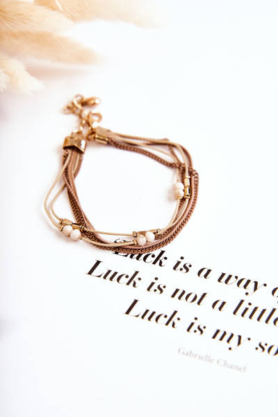 Жіночий регульований браслет з кристалами бежевого кольору