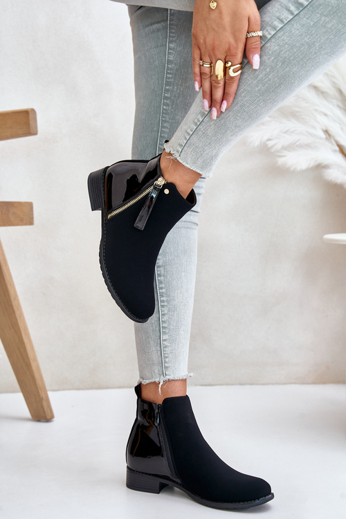Утеплені ботильйони на плоскому каблуці та низькій халяві чорного кольору Zinariella