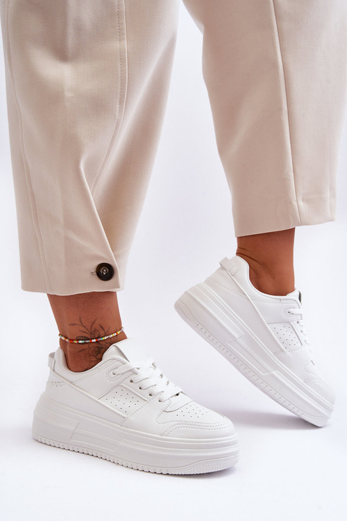 Жіноче шкіряне спортивне взуття на масивній платформі білого кольору Belisso