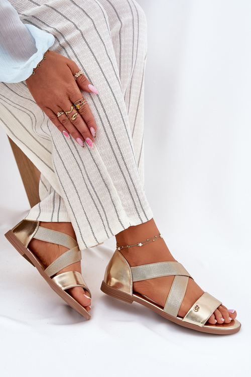 Жіночі плоскі сандалі з еластичними ремінцями золоті Marinea