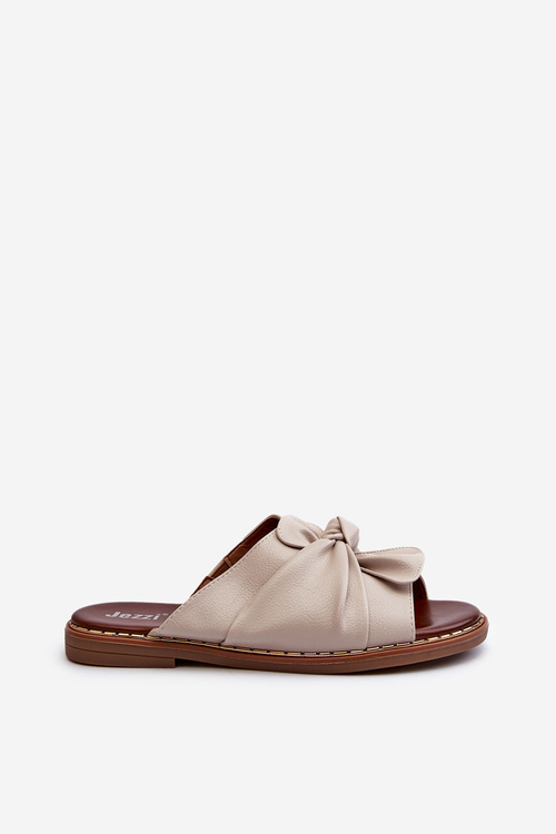 Жіночі босоніжки на плоскій підошві бежевого кольору Nelvira