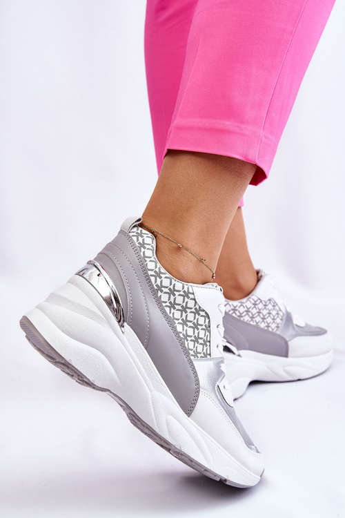 Жіноче спортивне взуття на платформі біло-сіре Ferrina