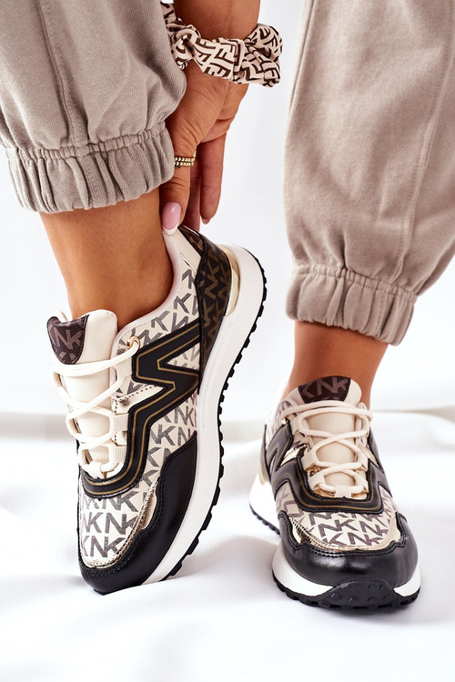 Жіноче спортивне взуття Кросівки бежево-чорні завжди