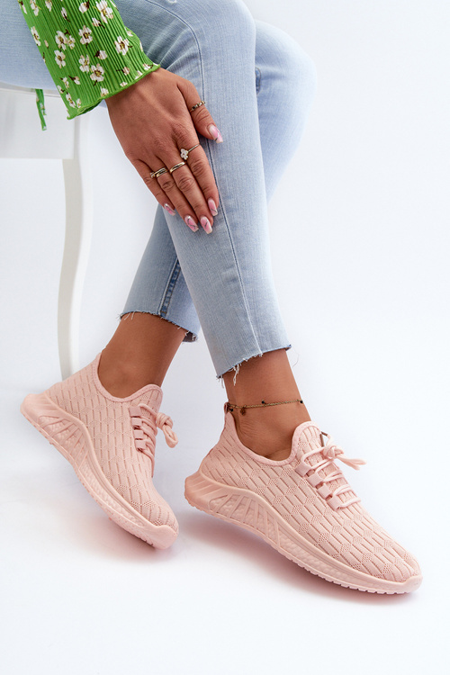 Жіноче спортивне взуття з легкої тканини рожевого кольору
