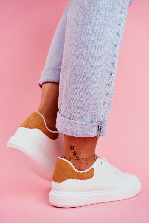 Жіноче спортивне взуття білого кольору на каблуці Milly