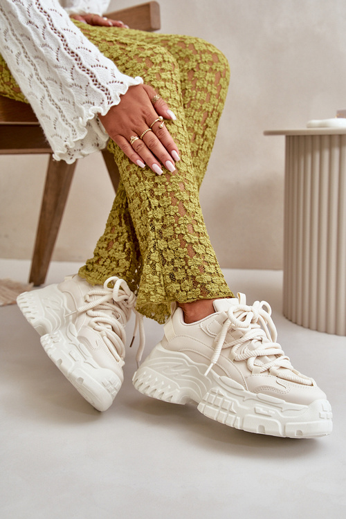 Жіночі кросівки на масивній підошві світло-бежевого кольору Nevela