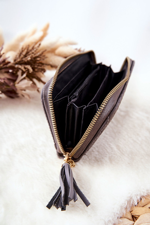 Стьобаний гаманець із китицею сірого кольору