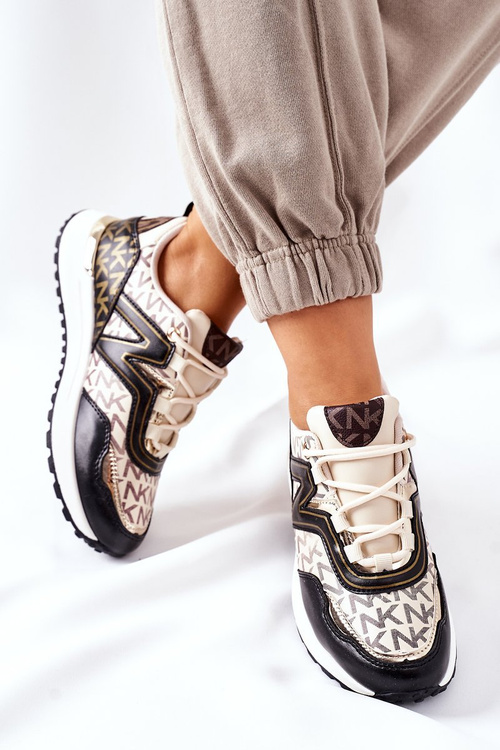 Жіноче спортивне взуття Кросівки бежево-чорні завжди