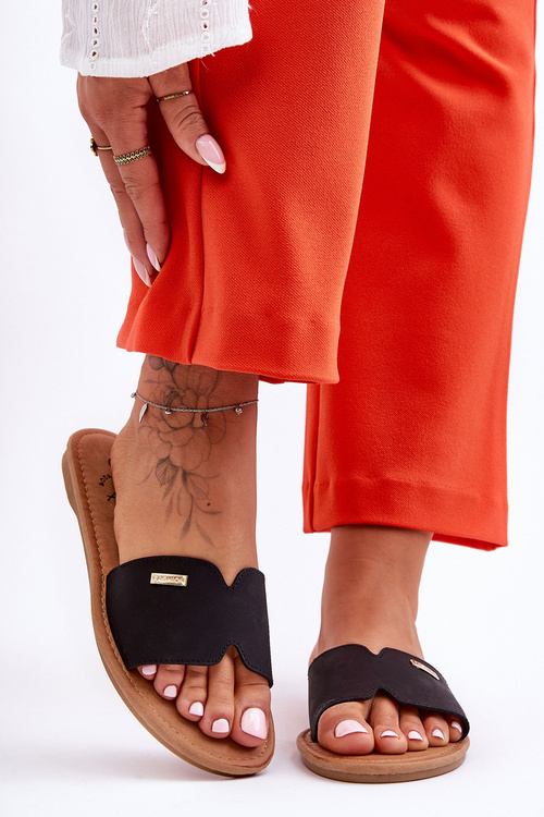 Жіночі зручні тапочки на плоскій каблуці чорного кольору Coraline