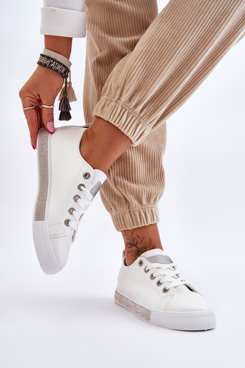 Жіночі низькі кросівки з форсунками біло-сріблясті Demira