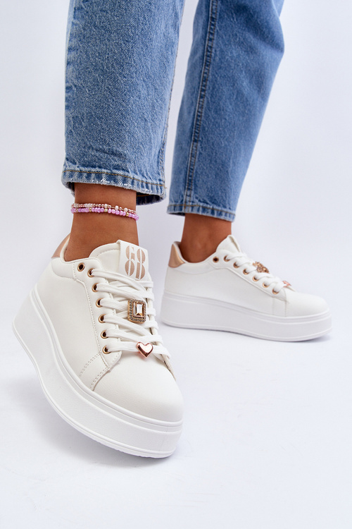 Жіночі кросівки на платформі з білими прикрасами Herbisa