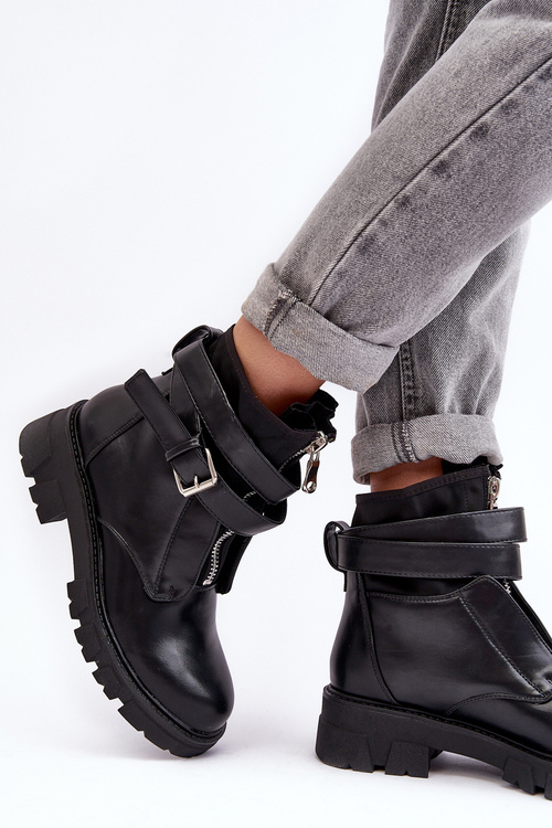 Утеплені чоботи чорні не справді