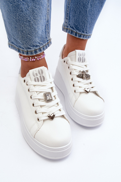 Жіночі кросівки на платформі з білими прикрасами Herbisa