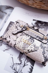 Жіночий гаманець NOBO Snake NPUR-H0110-CM00
