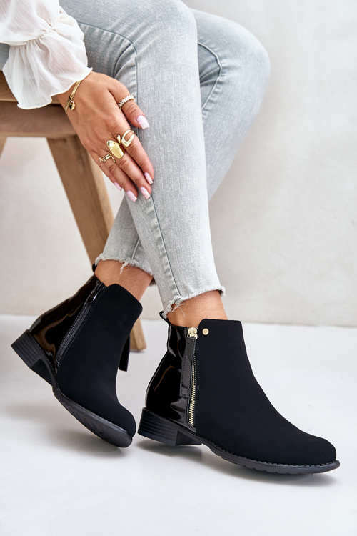 Утеплені ботильйони на плоскому каблуці та низькій халяві чорного кольору Zinariella