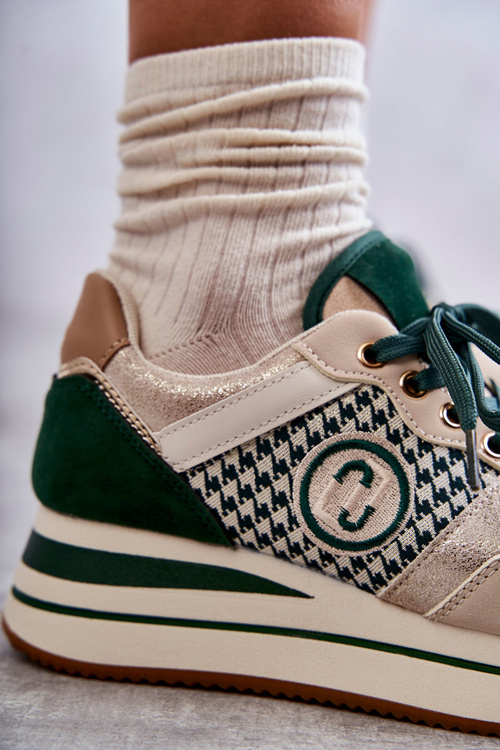 Модні жіночі спортивні туфлі на танкетці бежево-зелені Aronne