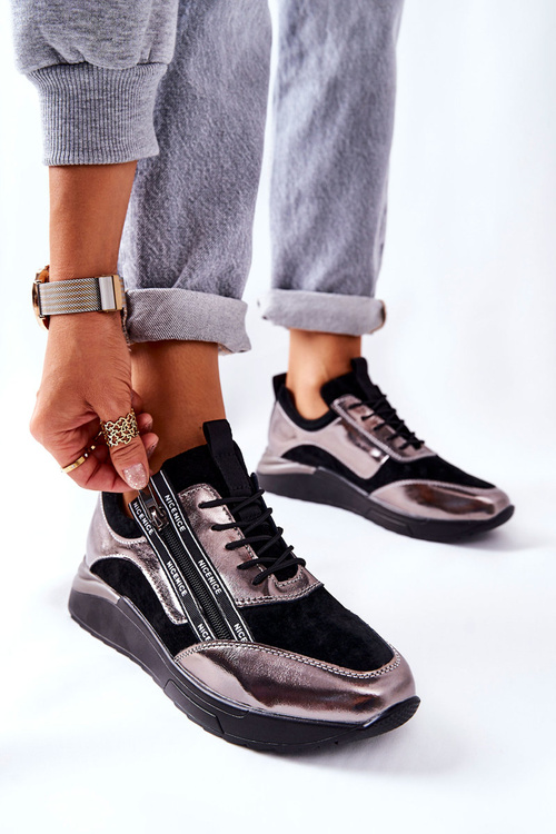 Шкіряне спортивне взуття Кросівки чорного та сріблястого кольору