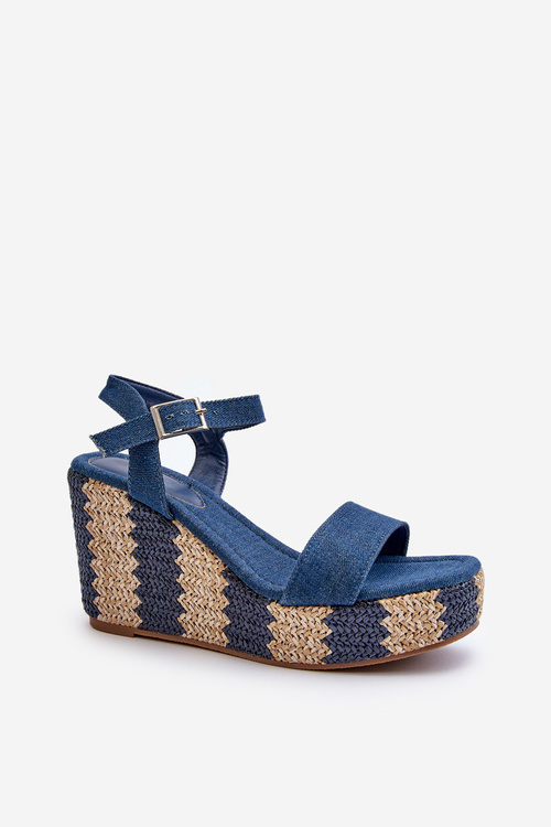 Жіночі джинсові босоніжки на танкетці з косою синього кольору Reviala