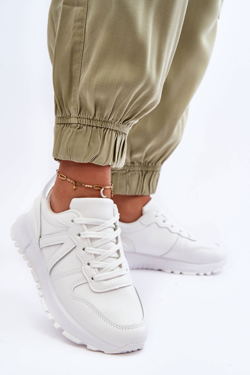 Жіноче шкіряне спортивне взуття білого кольору Kabama