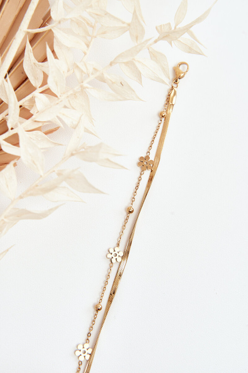 Жіночий браслет змійка з квітами золото