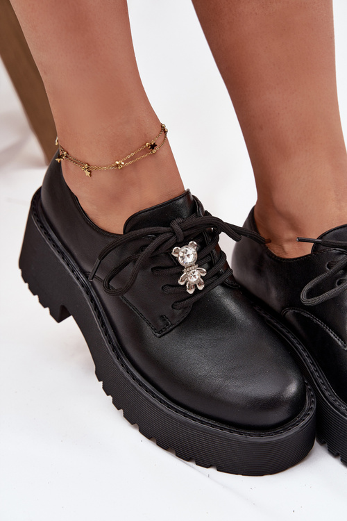 Жіночі мокасини з пряжкою з еко-шкіри чорні Laurea