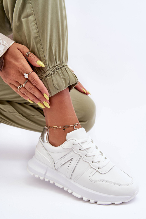 Жіноче шкіряне спортивне взуття білого кольору Kabama