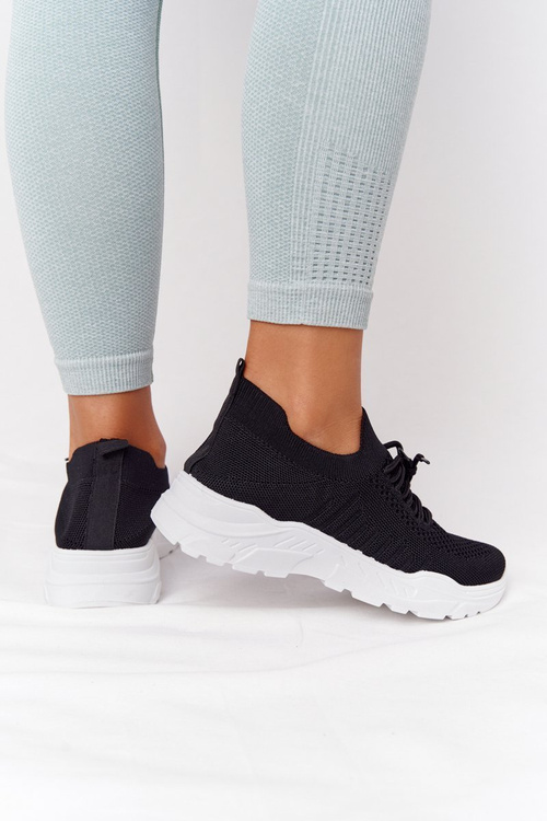 Жіноче спортивне взуття Кросівки чорні з білою підошвою