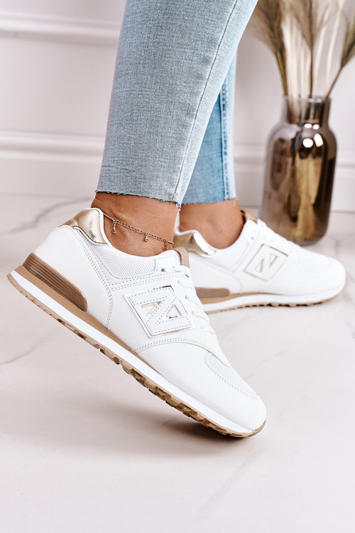 Жіноче спортивне взуття Кросівки біло-золоті Last Minute