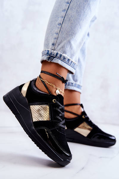 Жіночі замшеві спортивні туфлі на танкетці Larson чорного кольору